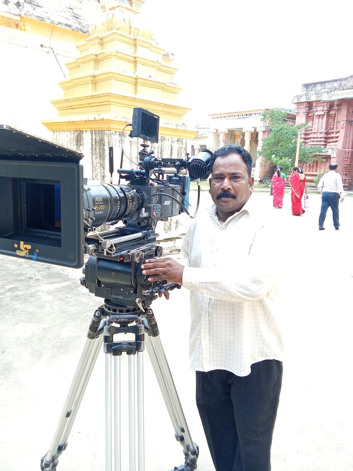Arun Prabhakar beside a professional cinema camera on location